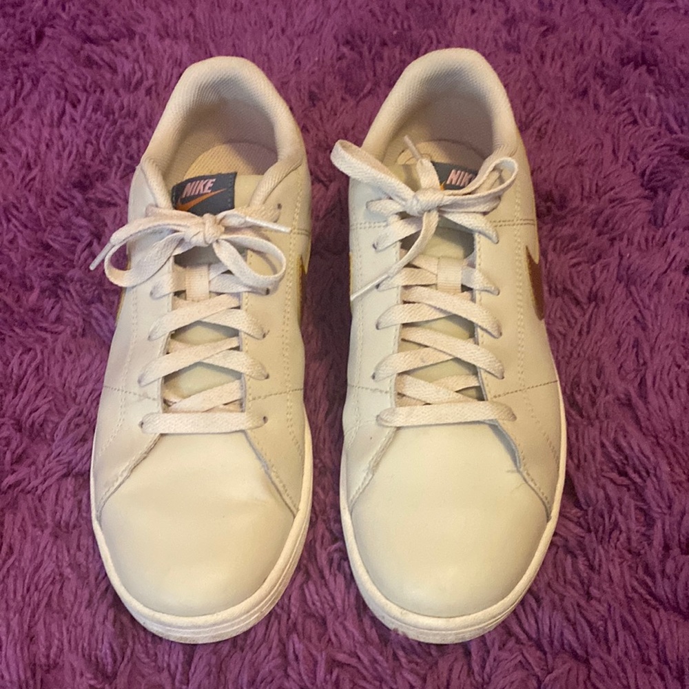 Rose gold Nike sneakers